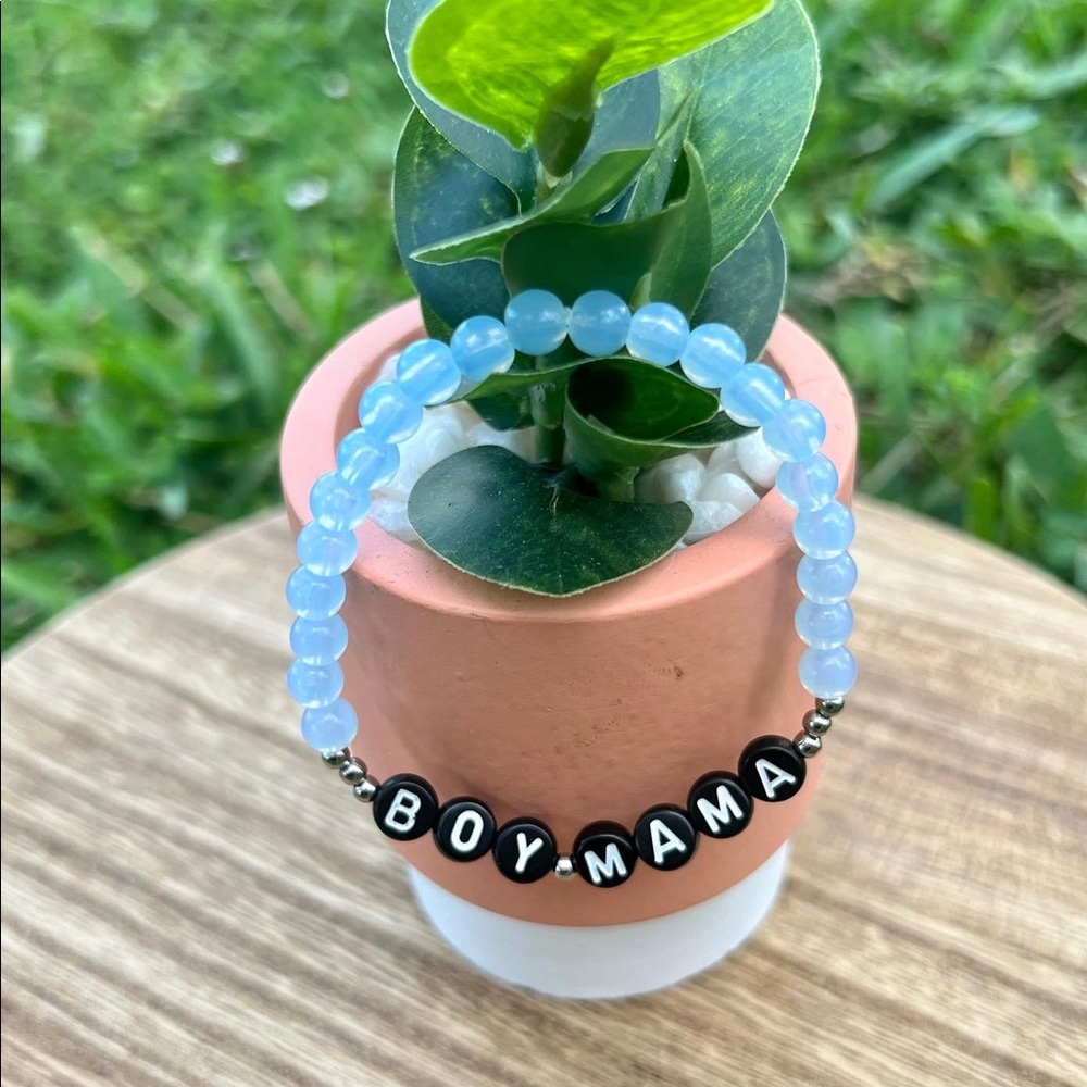 The Translucent Baby Blue Bracelet with Silver Spacers and Black Letters🦋